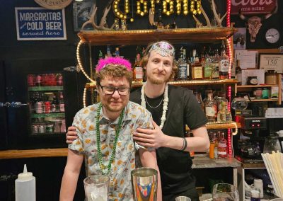 Branding Iron Pub Bartenders dressed for the Beach Party